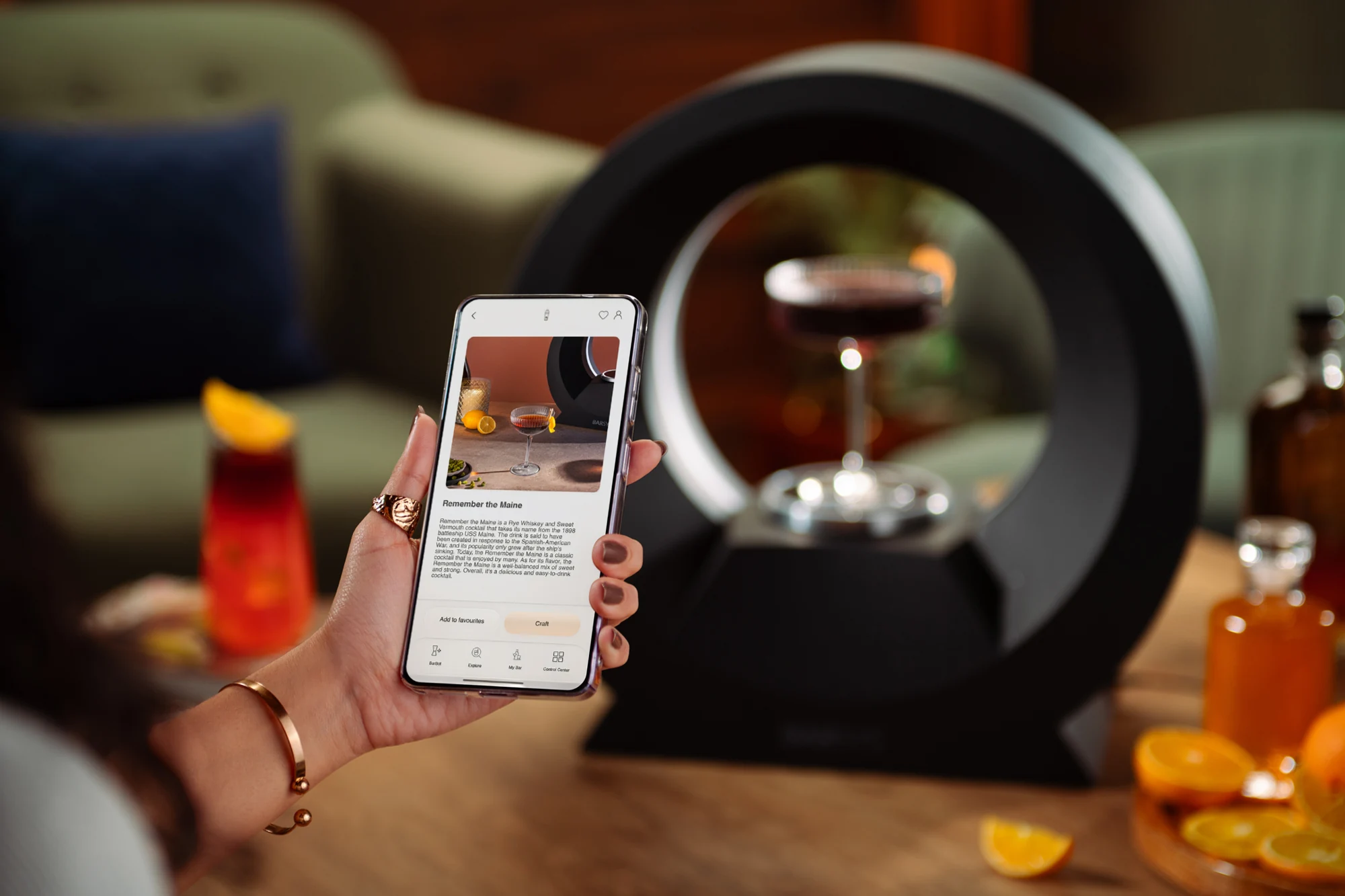The Barsys app with a cocktail